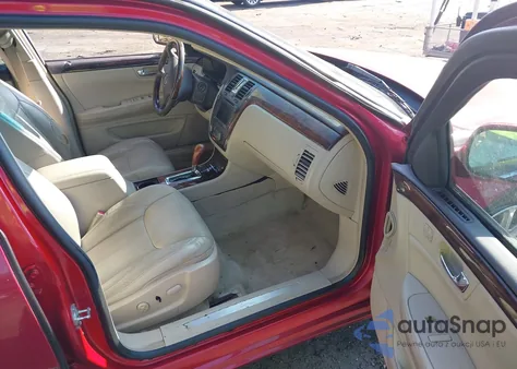 2009 Cadillac Dts 1Sc z USA, uszkodzony, nr VIN 1G6KD57Y79U123583